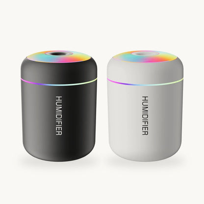Mini Glow Humidifier in black and in white, side by side at the same size